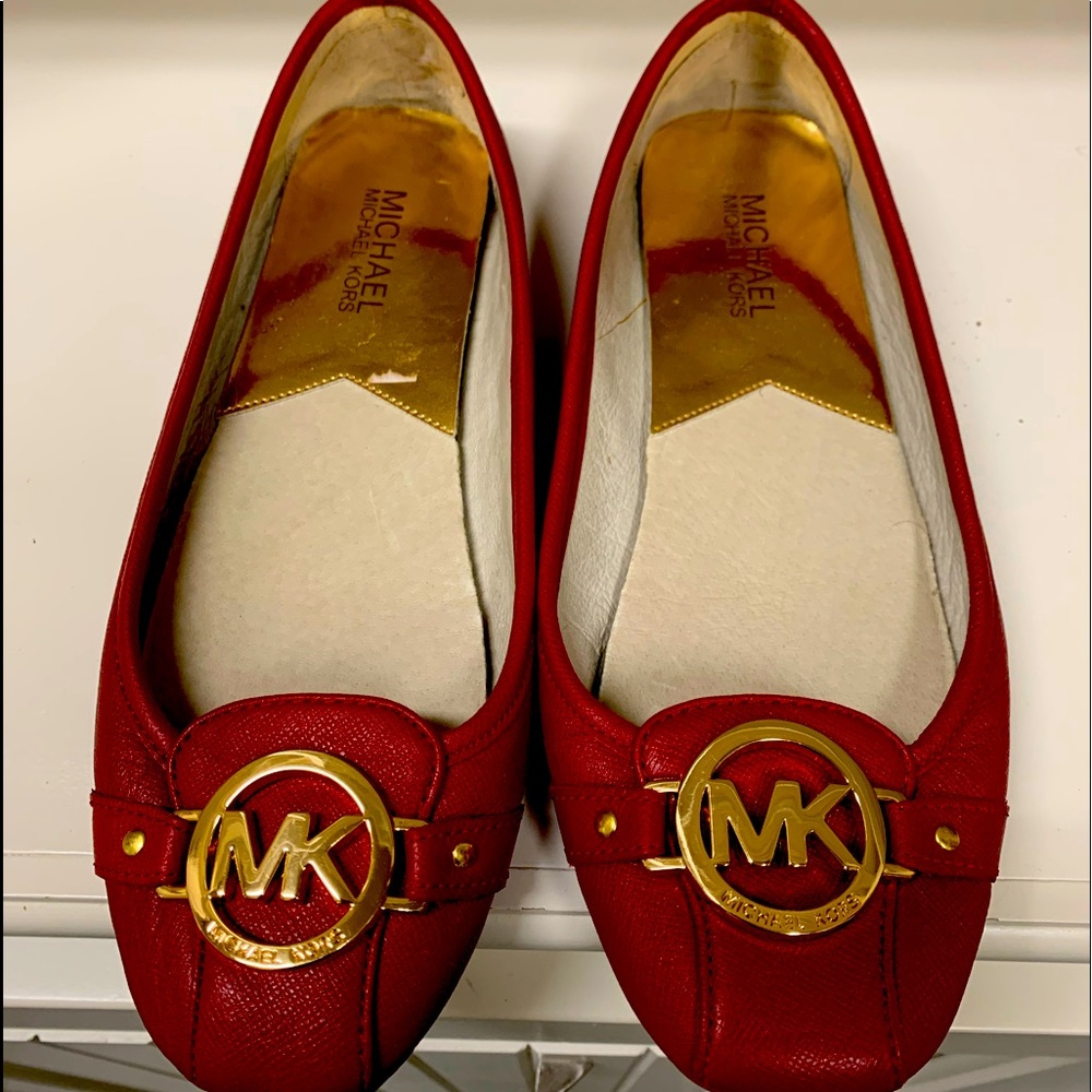 Red  MK flats.  Hardly worn.  In good condition